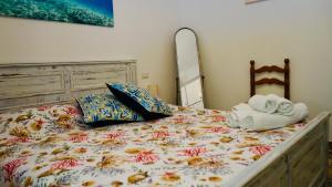 Posteľ alebo postele v izbe v ubytovaní Sole Mare - Casa Vacanze Chiavarello