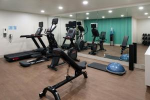 a gym with a bunch of exercise bikes in a room at Holiday Inn Express - Santa Rosa North by IHG in Santa Rosa +74 photos