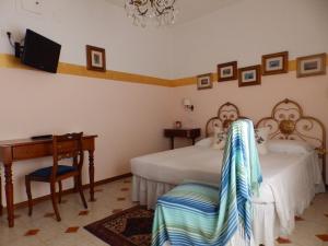 Postel nebo postele na pokoji v ubytování Sa Chessa B&B