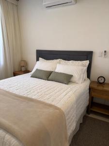 Llit o llits en una habitació de Modern apartment in Asunción