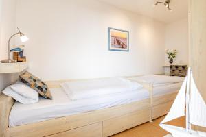 Giường trong phòng chung tại Hooge Whg 28 Utspann +20 ảnh