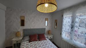 Cama o camas de una habitación en Casa Santa Maria I con barbacoa