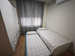 Ένα ή περισσότερα κρεβάτια σε δωμάτιο στο Estrella Relax +20 φωτογραφίες