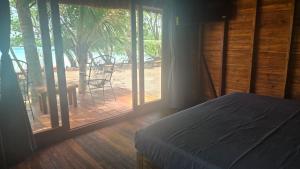 Postel nebo postele na pokoji v ubytování Playa Laguna Bacalar Beach Front