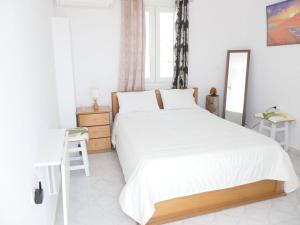 Ένα ή περισσότερα κρεβάτια σε δωμάτιο στο Valentina Central Studio