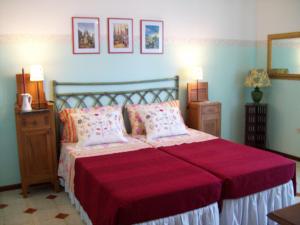 Postel nebo postele na pokoji v ubytování Sa Chessa B&B