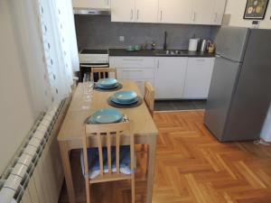 Dapur atau dapur kecil di Apartman Turist +10 gambar