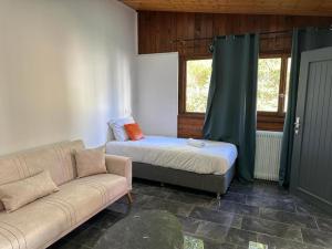 Posezení v ubytování Hotel Parc Les Cigognes + 11 fotografií