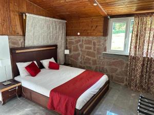 Postel nebo postele na pokoji v ubytování Hotel Parc Les Cigognes