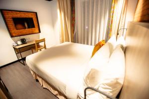 Voodi või voodid majutusasutuse ONOMO Hotel Kampala toas