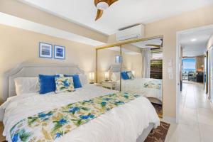 Ένα ή περισσότερα κρεβάτια σε δωμάτιο στο Noelani 207 +40 φωτογραφίες