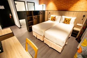 Voodi või voodid majutusasutuse ONOMO Hotel Kampala toas