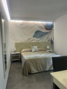En eller flere senge i et værelse på Eolia Rooms + 170 billeder
