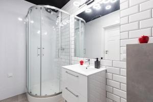 Kúpeľňa v ubytovaní SuperApart Obywatelska 42 + 25 fotografií