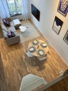 TV a/nebo společenská místnost v ubytování Lomma Harbour Apartment