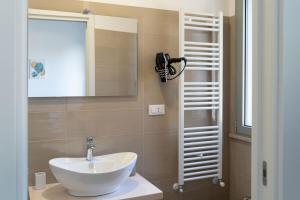 Koupelna v ubytování Smilax - Hydruntum Holiday Rooms