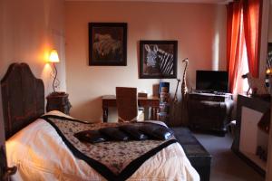 Letto o letti in una camera di Manoir des Chanterelles