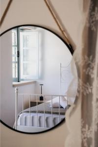 Postel nebo postele na pokoji v ubytování Siogkas Inn