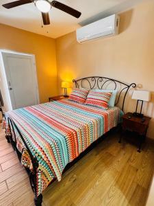 Ένα ή περισσότερα κρεβάτια σε δωμάτιο στο Vaquita Marina House