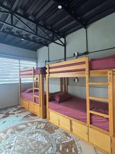 Postel nebo postele na pokoji v ubytování Canova Hostel & Pizza