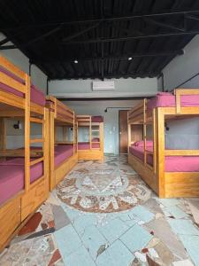Postel nebo postele na pokoji v ubytování Canova Hostel & Pizza