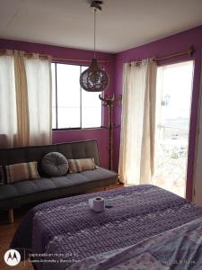 Ένα ή περισσότερα κρεβάτια σε δωμάτιο στο Malabrigo Beach - Restaurante y hospedaje