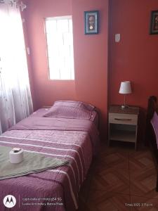 Ένα ή περισσότερα κρεβάτια σε δωμάτιο στο Malabrigo Beach - Restaurante y hospedaje +1 φωτογραφίες