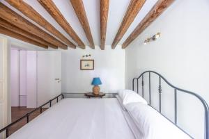 Posteľ alebo postele v izbe v ubytovaní Cà Gamba by Venicevillas, Guglie