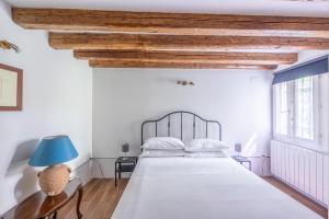 Posteľ alebo postele v izbe v ubytovaní Cà Gamba by Venicevillas, Guglie