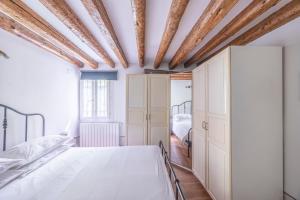 Posteľ alebo postele v izbe v ubytovaní Cà Gamba by Venicevillas, Guglie