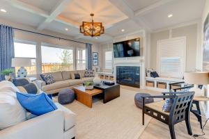 a living room with a couch and a fireplace at Cozy Montana Escape Near Bozeman & Yellowstone in Belgrade