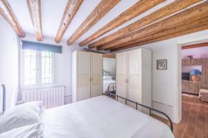 Posteľ alebo postele v izbe v ubytovaní Cà Gamba by Venicevillas, Guglie