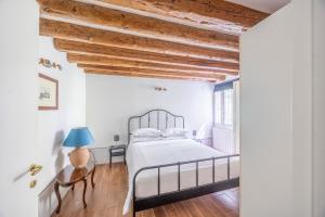 Posteľ alebo postele v izbe v ubytovaní Cà Gamba by Venicevillas, Guglie