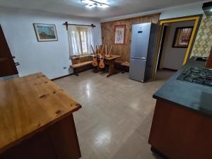 Kuchyň nebo kuchyňský kout v ubytování Alma Hunting Lodge + 5 fotografií
