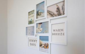 a collage of pictures on a wall at 1 Bedroom Amazing Apartment In Oostende in Ostend