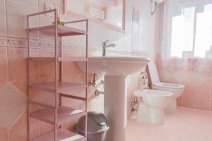 a bathroom with a sink and a toilet at Domus Aromatica in Assisi +281 photos