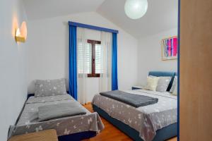 Posteľ alebo postele v izbe v ubytovaní Ana del Sol - ZF Hvar