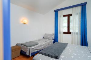 Posteľ alebo postele v izbe v ubytovaní Ana del Sol - ZF Hvar