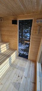 an inside view of a sauna with a window at Domek pod Kozińcem SAUNA JACUZZI Zakopane in Zakopane +51 photos