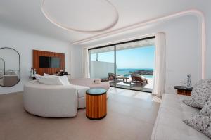 Posezení v ubytování Muse οf Mykonos Luxury Suites