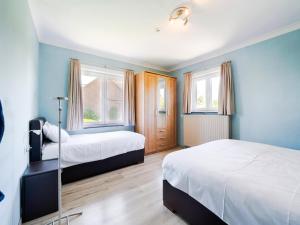 Ένα ή περισσότερα κρεβάτια σε δωμάτιο στο Villa Borgloon with Blossom Views and Jacuzzi +32 φωτογραφίες