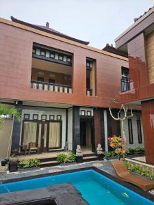Bazén v ubytování Ubud Canti Accommodation nebo v jeho okolí