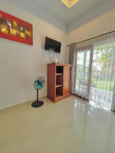 TV a/nebo společenská místnost v ubytování Sekumpul Accommodation