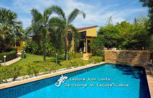 Πισίνα στο ή κοντά στο Escape-Cabins