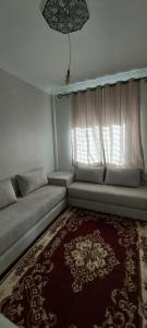 Ruang duduk di Maison Luxueux et Spacieux
