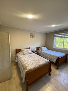 Postel nebo postele na pokoji v ubytování Terraza Traslaviña
