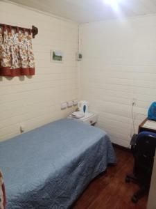 Ένα ή περισσότερα κρεβάτια σε δωμάτιο στο Rubi 1