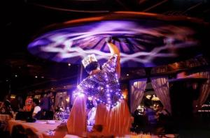 a woman dancing on a table at a party at الباخرة نايل كروز ريفر بوت in Cairo +17 photos