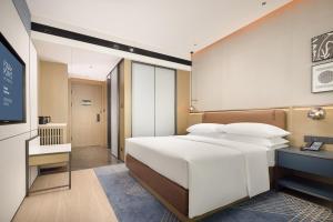 Postelja oz. postelje v sobi nastanitve Four Points by Sheraton Chengdu, Chunxi Road
