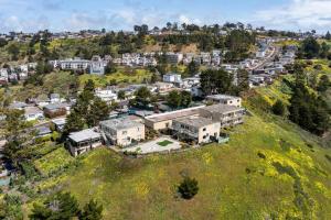 an aerial view of a city with houses at Stunning 2BR with Ocean, Mountain & Sunset Views in Pacifica